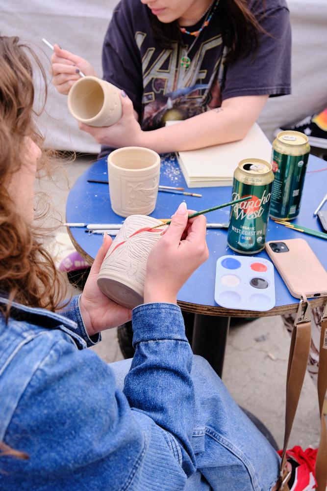 Girl painting in a workshop