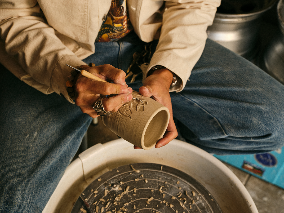 Danny carving a tumbler