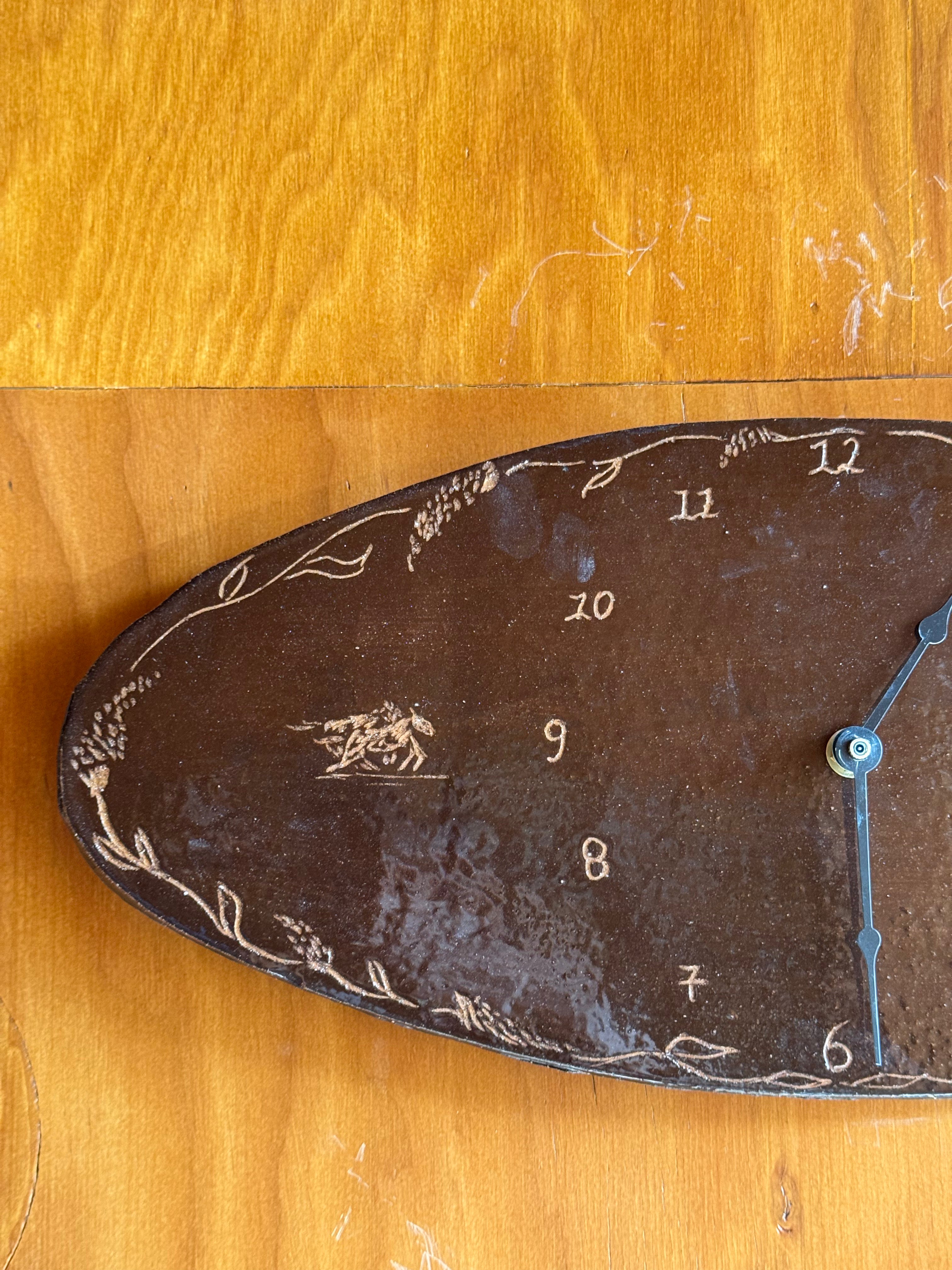 Solo Ride Oval Clock